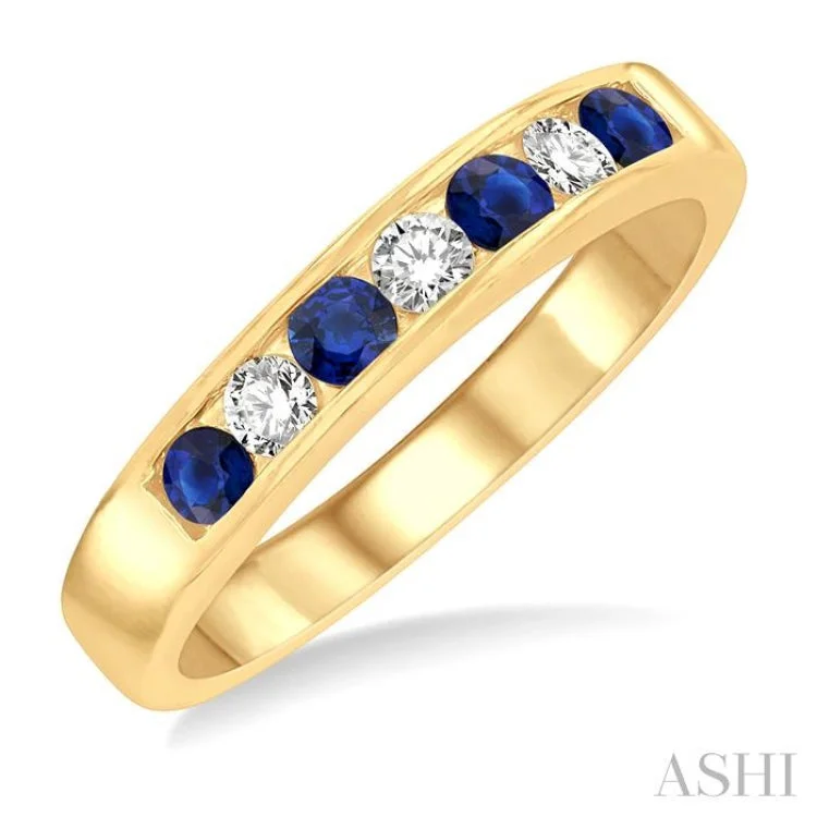 Simple Silver Ring for Bridesmaids-1/5 Ctw Channel Set Round Cut Diamond and 2.5 MM Round Cut Sapphire Band in 14K Yellow Gold