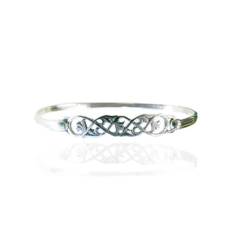 Statement Bangles for Bold Fashion-Celtic Interweave Bangle in Silver