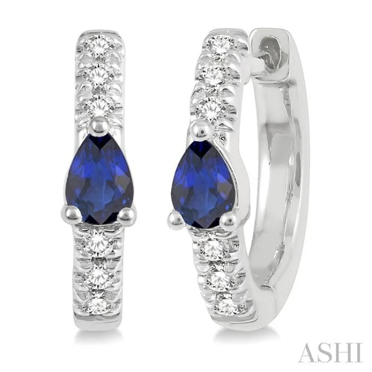 Swarovski Crystal Earrings-1/10 Ctw 4X3MM Pear Cut Sapphire and Round Cut Diamond Huggie Earrings in 10K White Gold