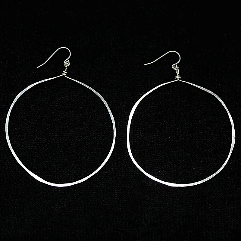 Artistic Earrings for Fashion Lovers-Artisan Hammered Silver Hoop Earrings by Brin