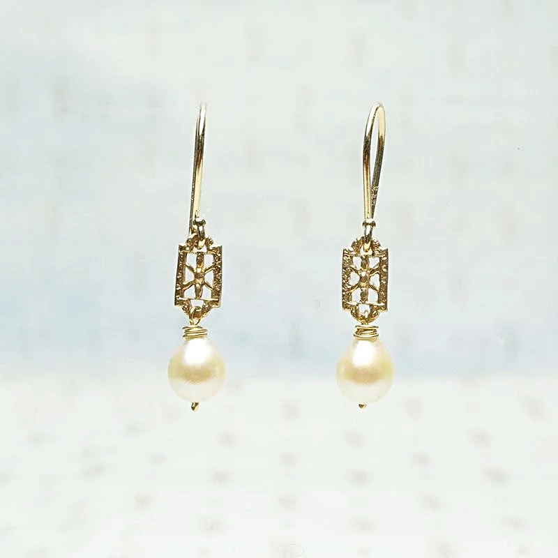 Bold Earrings for Fashionistas-Baroque Pearl and Filigree Earrings by brunet